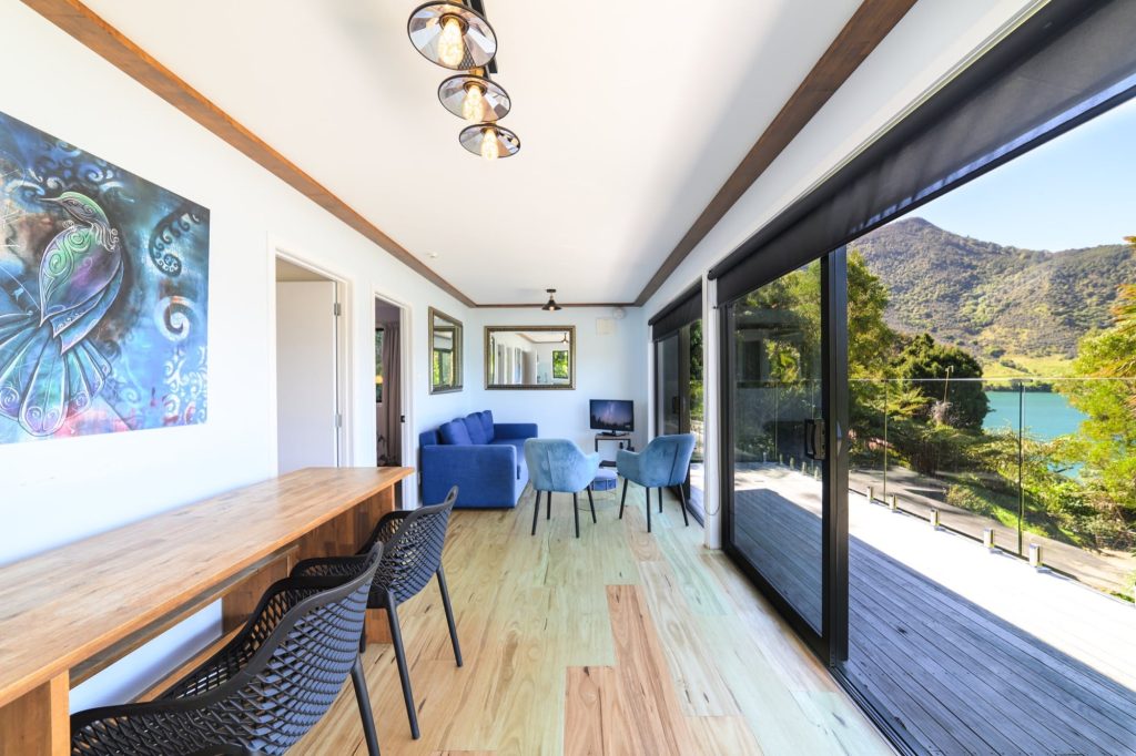 Open kitchen and living room in Kereru Cottage