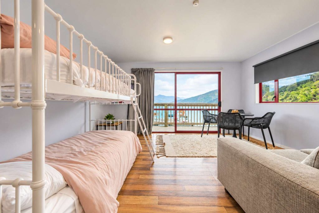 Bunks in the living area, the balcony beyond