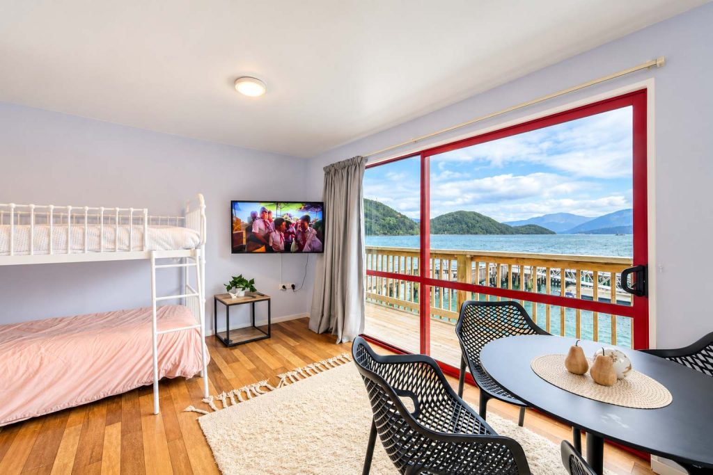 Bunks beside the window to the water