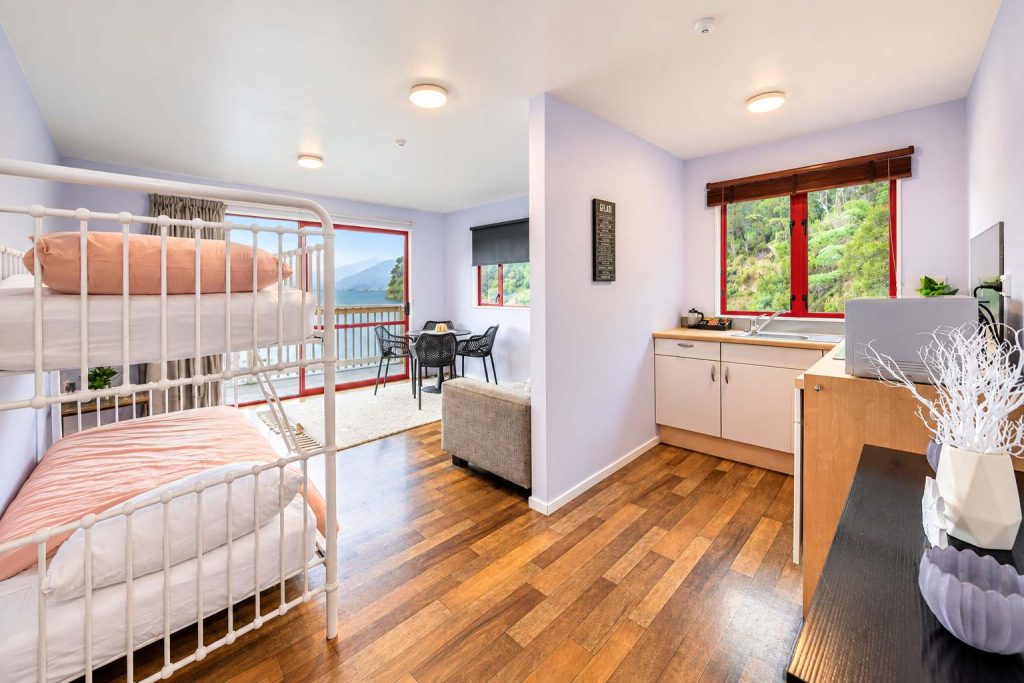 Living area with bunks and dining table